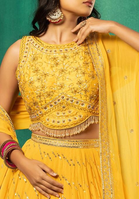 Beautifully Heavy Embroidered Strappy Top And Lehenga With Contrasting Dupatta