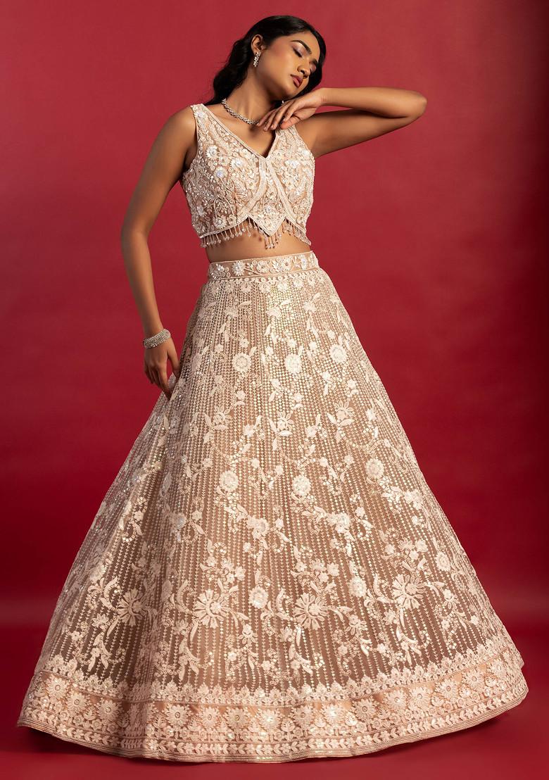 Nude lehenga with 3D flower embroidery, tie up blouse and smocked stole –  Esha Sethi Thirani