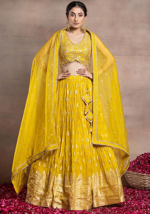 Mustard Brocade Lehenga Set With Floral Embellished Blouse And Embroidered Dupatta