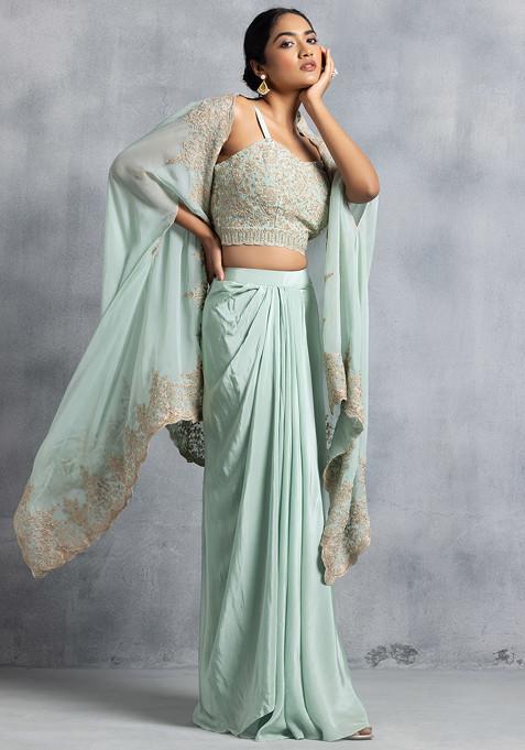 Pastel Green Pleated Skirt Set With Floral Thread Embroidered Blouse And Embroidered Cape