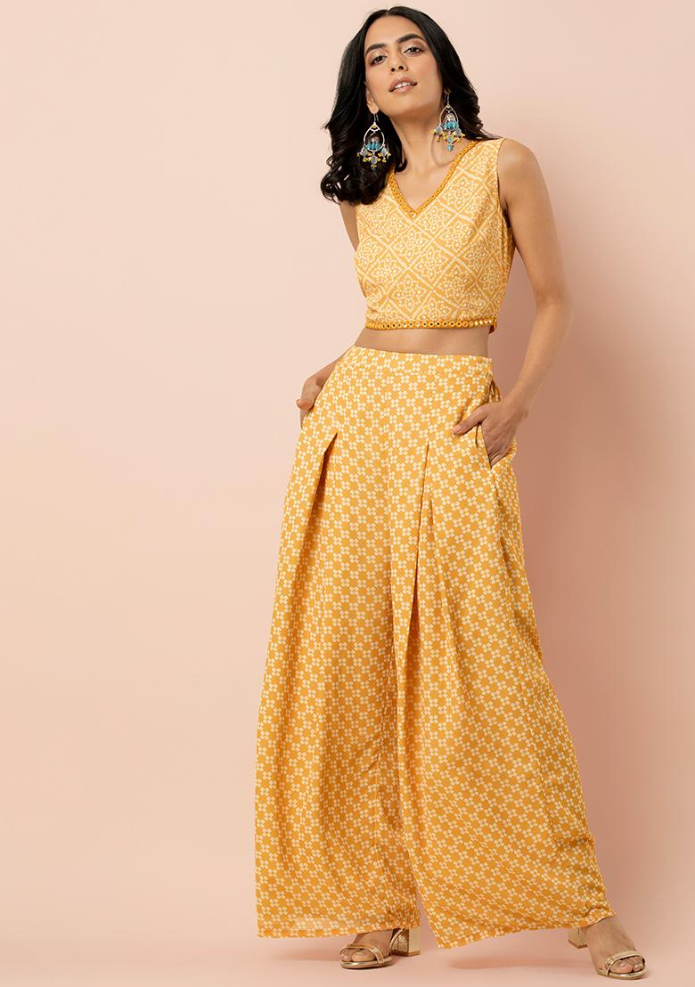 yellow pleated pants