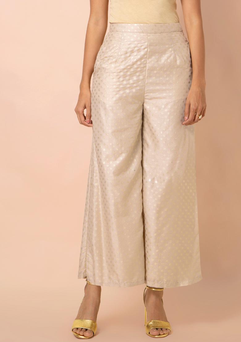 Buy Women Beige Foil Floral Flared Palazzo Pants - RTW - Indya