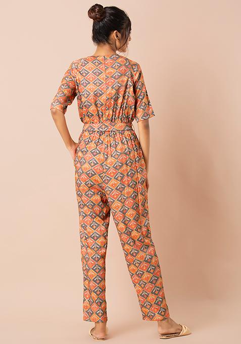 Buy Women Orange Floral Belted Jumpsuit With Pockets - RTW - Indya
