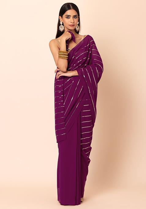 Sangria Purple Embroidered Pallu Georgette Saree With Gold Lycra Unstitched Blouse     