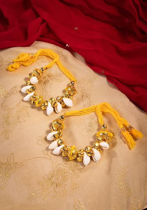 Yellow Ghungroo And Shell Embellished Tie Up Bracelet (Set of 2)