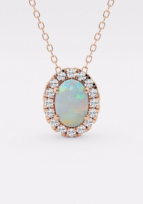 7.9x5.53 mm Oval Created Opal and 1/5 ctw Round Lab Grown Diamond Halo Pendant with Adjustable Chain