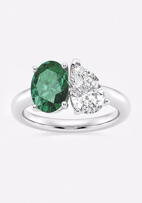 9x7mm Oval Cut Created Emerald and 1 1/2 ctw Pear Cut Lab Grown Diamond Two Stone Engagement Ring