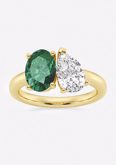 9x7mm Oval Cut Created Emerald and 1 1/2 ctw Pear Cut Lab Grown Diamond Two Stone Engagement Ring