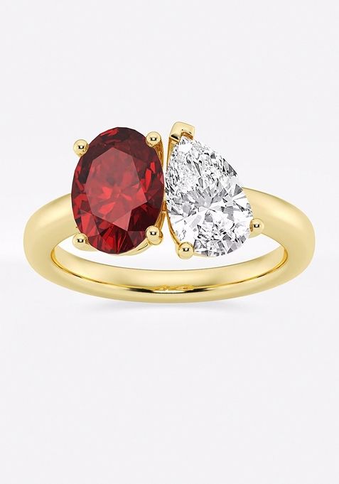 9x7mm Oval Cut Created Ruby and 1 1/2 ctw Pear Cut Lab Grown Diamond Two Stone Engagement Ring