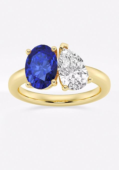 9x7mm Oval Cut Created Sapphire and 1 1/2 ctw Pear Cut Lab Grown Diamond Two Stone Engagement Ring