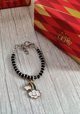 Silver Coloured Black Evil Eye Baby Rakhi With Greeting Card