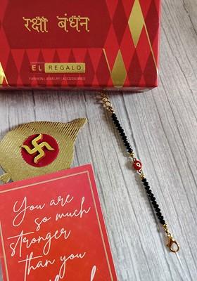 Baby Goldcoloured Red Evil Eye Rakhi With Roli Chawal And Raksha Bandhan Card