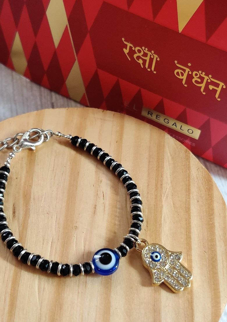 Gold Coloured Black Evil Eye Baby Rakhi With Roli Chawal Raksha Bandhan Card