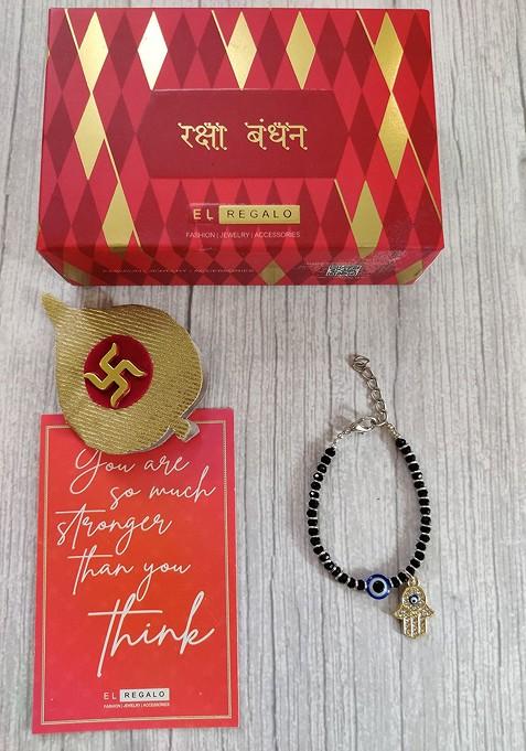 Gold Coloured Black Evil Eye Baby Rakhi With Roli Chawal Raksha Bandhan Card