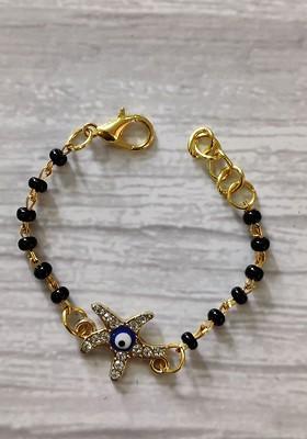 Kids Goldtoned Nazaria Rakhi Combo With Greeting Card And Roli Chawal Shagun