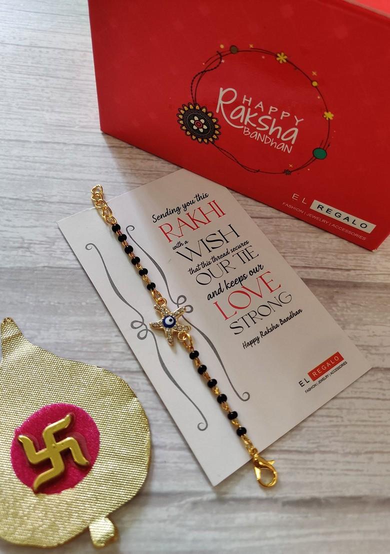 Kids Goldtoned Nazaria Rakhi Combo With Greeting Card And Roli Chawal Shagun - Indya