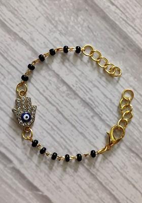 Kids Goldtoned Nazaria Rakhi Combo With Greeting Card And Roli Chawal Shagun