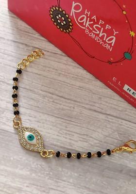 Kids Goldtoned Nazaria Rakhi Combo With Greeting Card And Roli Chawal Shagun