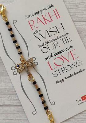 Kids Goldtoned Nazaria Rakhi Combo With Greeting Card And Roli Chawal Shagun