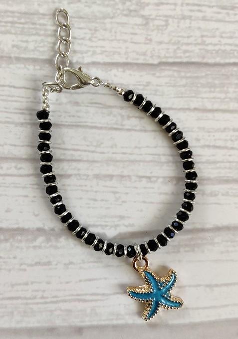 Unisex Blue Nazaria Rakhi Combo With Greeting Card And Roli Chawal Shagun