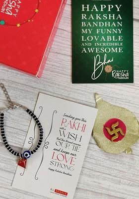 Kids Red Nazaria Rakhi Combo With Greeting Card And Roli Chawal Shagun