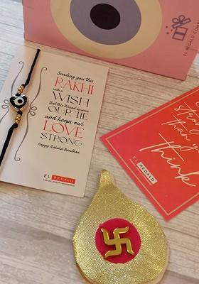Evil Eye Rakhi Combo For Bhaiya With Roli Chawal Shagun And Greeting Card
