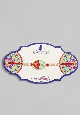 Red Red And Green Enamelled Sikh Holy Mark Ruby Stoned Thread Rakhi