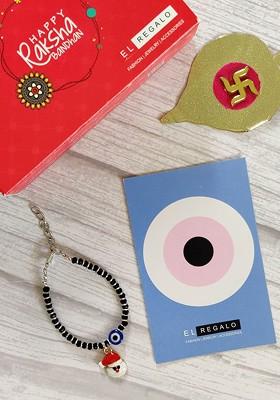 Kids Red Nazaria Rakhi Combo With Greeting Card And Roli Chawal Shagun