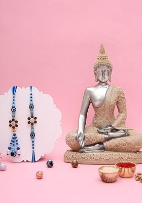 Set Of 2 Rakhi With Buddha Showpiece