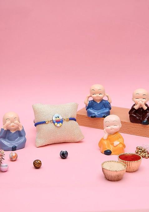 5Pcs Rakhis With Monk Figurines Card And Roli Chawal