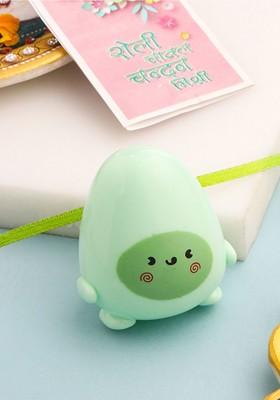 Green Kids Assorted Sharpener Design Thread Rakhi Roli Chawal Chandan And Mishri
