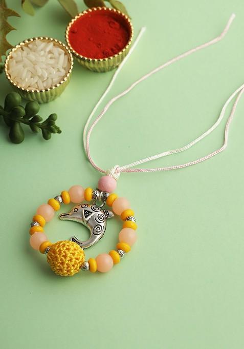 Yellow Whale Beaded Elasticated Rakhi With Roli Chawal And Greeting Card