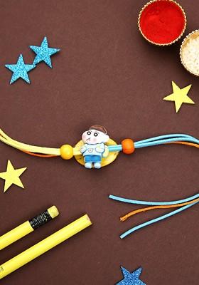 Blue Blue Shin Chan Cartoon Thread Rakhi With Roli Chawal And Greetings Card