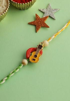 Yellow Little Guitar Twisted Thread Rakhi With Roli Chawal And Greetings Card
