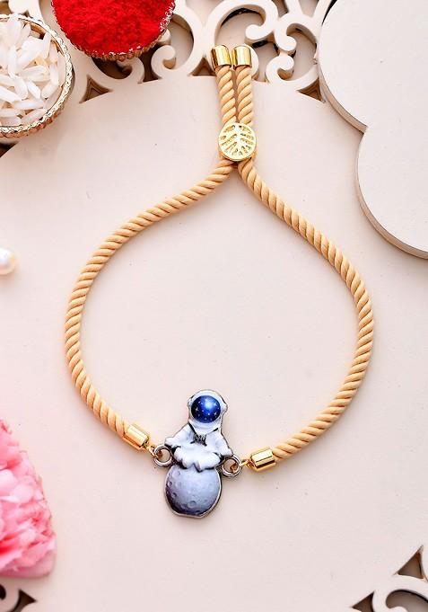 Cream Boys Thread Rakhi With Roli Chawal And Greetings Card