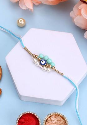 White Goldplated Pearls Thread Rakhi With Roli Chawal
