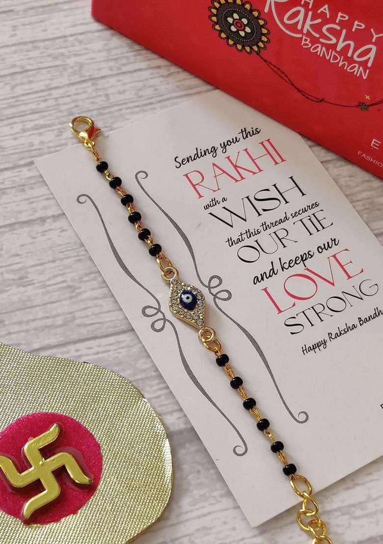 Kids Goldplated Nazaria Rakhi With Greeting Card And Roli Chawal Shagun - Indya