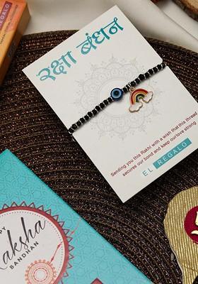 Kids Evil Eye And Rainbow Charm Rakhi With Roli Chawl And Greeting Card