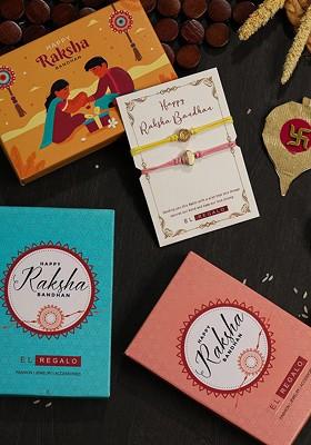 Yellow Pack Of 2 Abstract Design Thread Rakhi With Greeting Card Gift Set