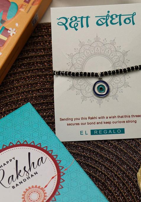 Kids Set Of 2 Evil Eye And Rainbow Charm Rakhi With Roli Chawl And Card Gift Set Box