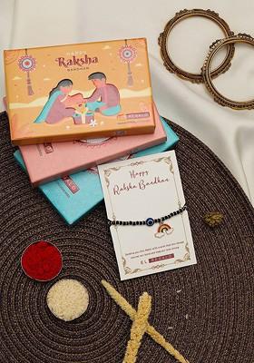 Kids Evil Eye And Rainbow Charm Design Rakhi With Roli Chawl And Card Gift Set Box