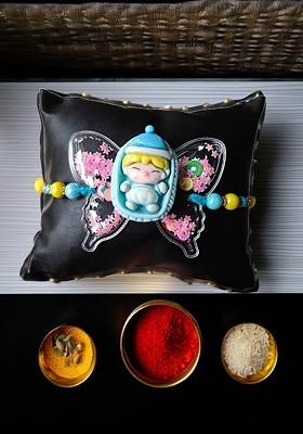 Blue Kids Sleeping Baby Butterfly Thread Rakhi