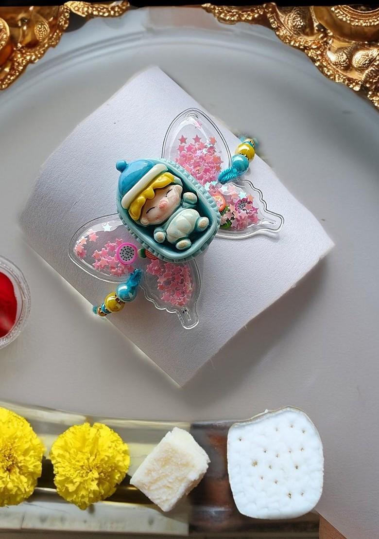 Blue Kids Sleeping Baby Butterfly Thread Rakhi - Indya