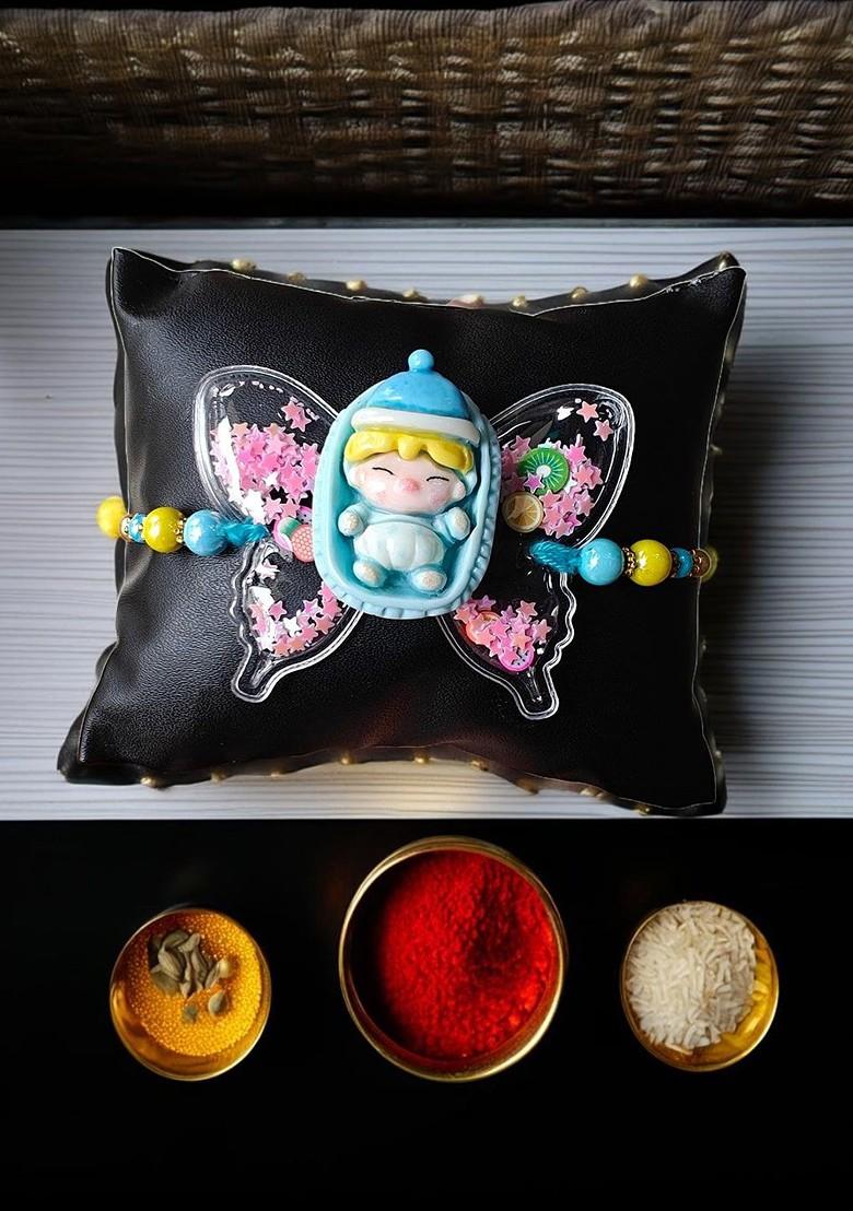 Blue Kids Sleeping Baby Butterfly Thread Rakhi - Indya