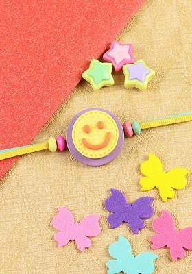Smiley Kids Thread Bracelet Rakhi With Roli Chawal