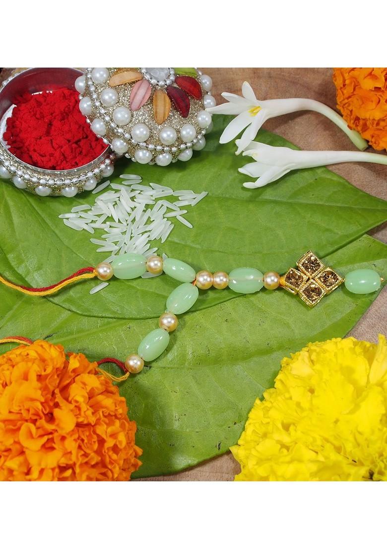 Green And Gold Toned Set 2 Pearl Studded And Beaded Lumba Rakhi With Greetings Card