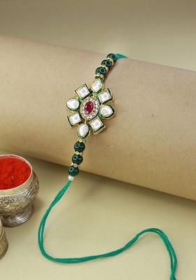 Gold Toned And Green Floral Kundan Studded Rakhi