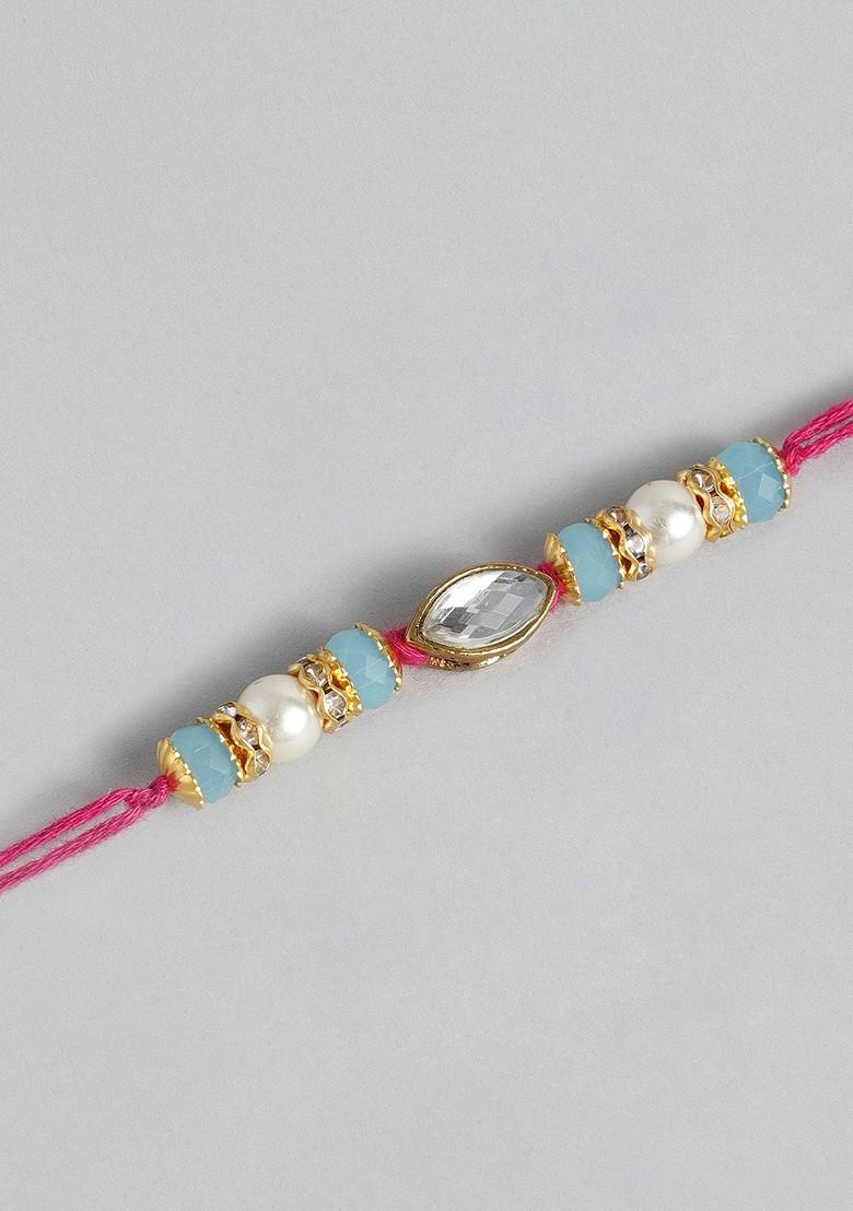 Gold Toned And White Beads Studded Rakhi - Indya