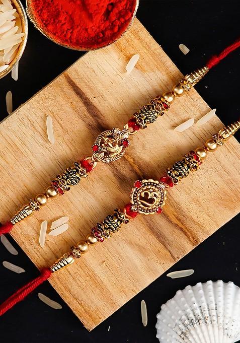 Pack Of 2 Religious Rakhis And Roli Chawal