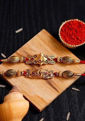 Set Of 2 Red And Gold Toned Rakhi With Roli Chawal